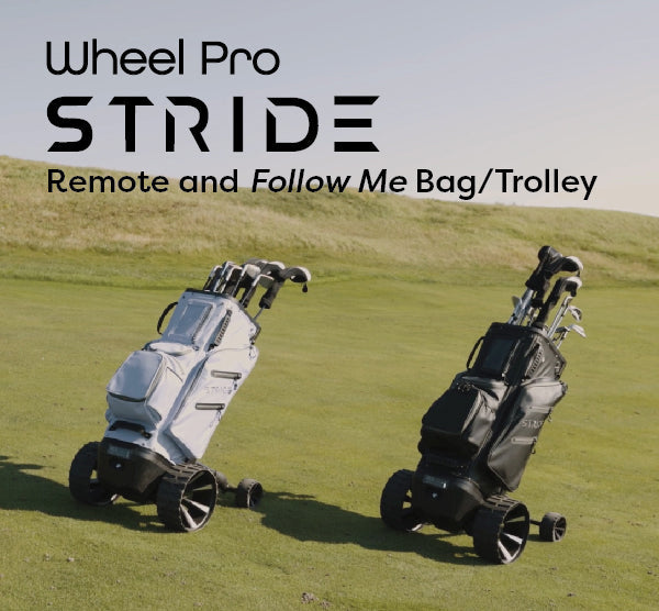 Zero Friction STRIDE remote and follow-me golf trolley bags in white and black on a green golf course fairway.